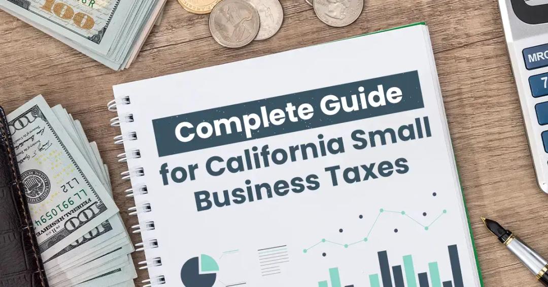 A guidebook titled "complete guide for california small business taxes" on a desk with cash, coins, and a calculator.
